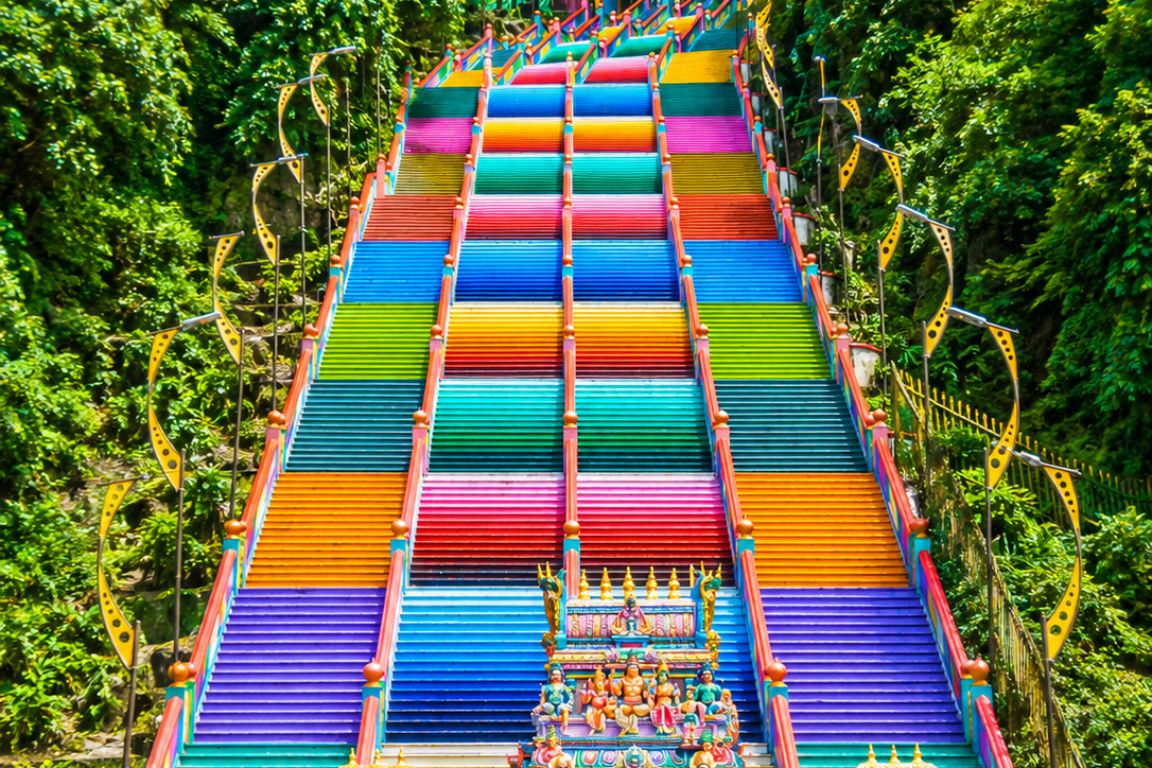 Famous 272 steps Rainbow Staircase at Batu Caves captured during a guided cultural tour with Batu Caves Tours